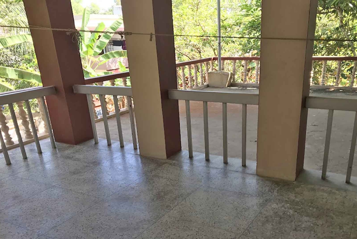 First floor balcony view of Karthika Road neighborhood