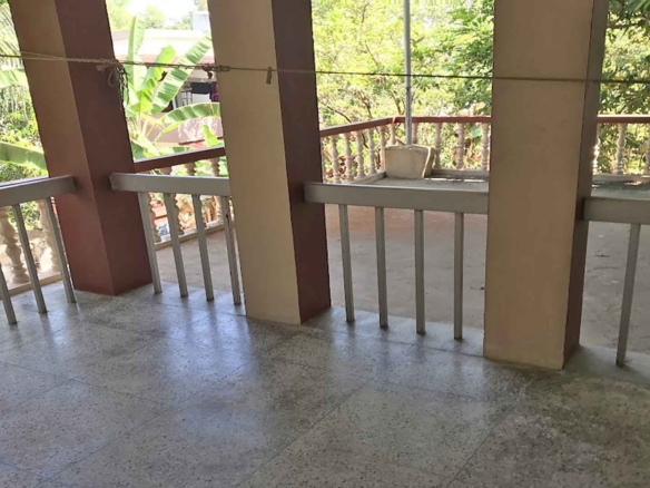 First floor balcony view of Karthika Road neighborhood