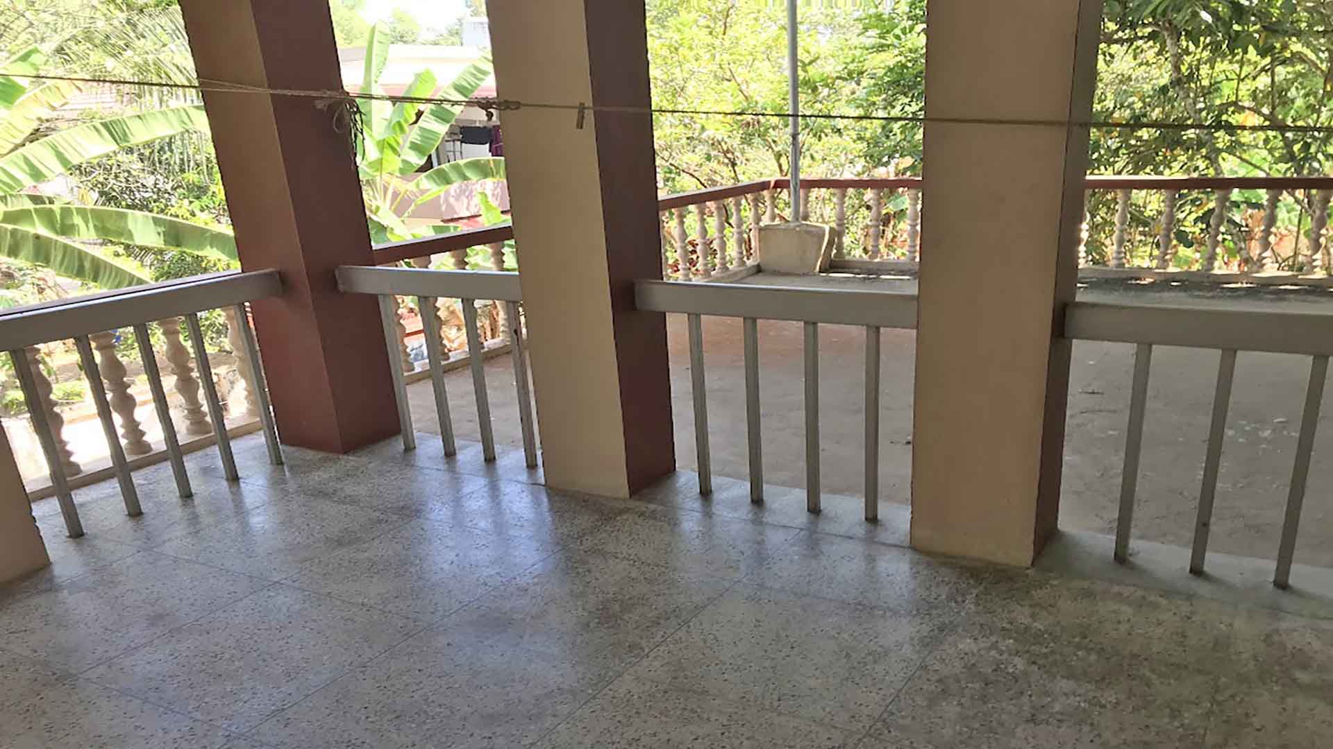 First floor balcony view of Karthika Road neighborhood