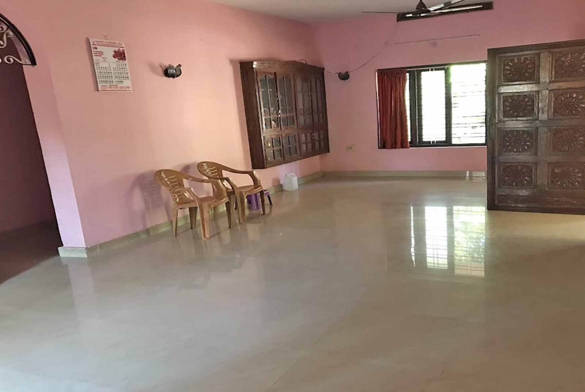 Interior living room with tiled floor in Chengannur house