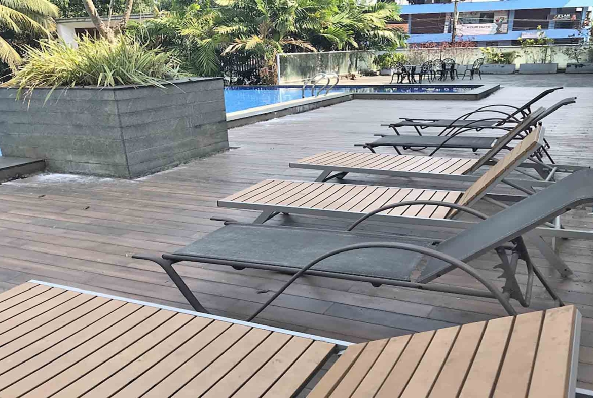 Infinity-edge swimming pool at Skyline The Edge luxury apartments in Thirumoola, Thiruvalla.