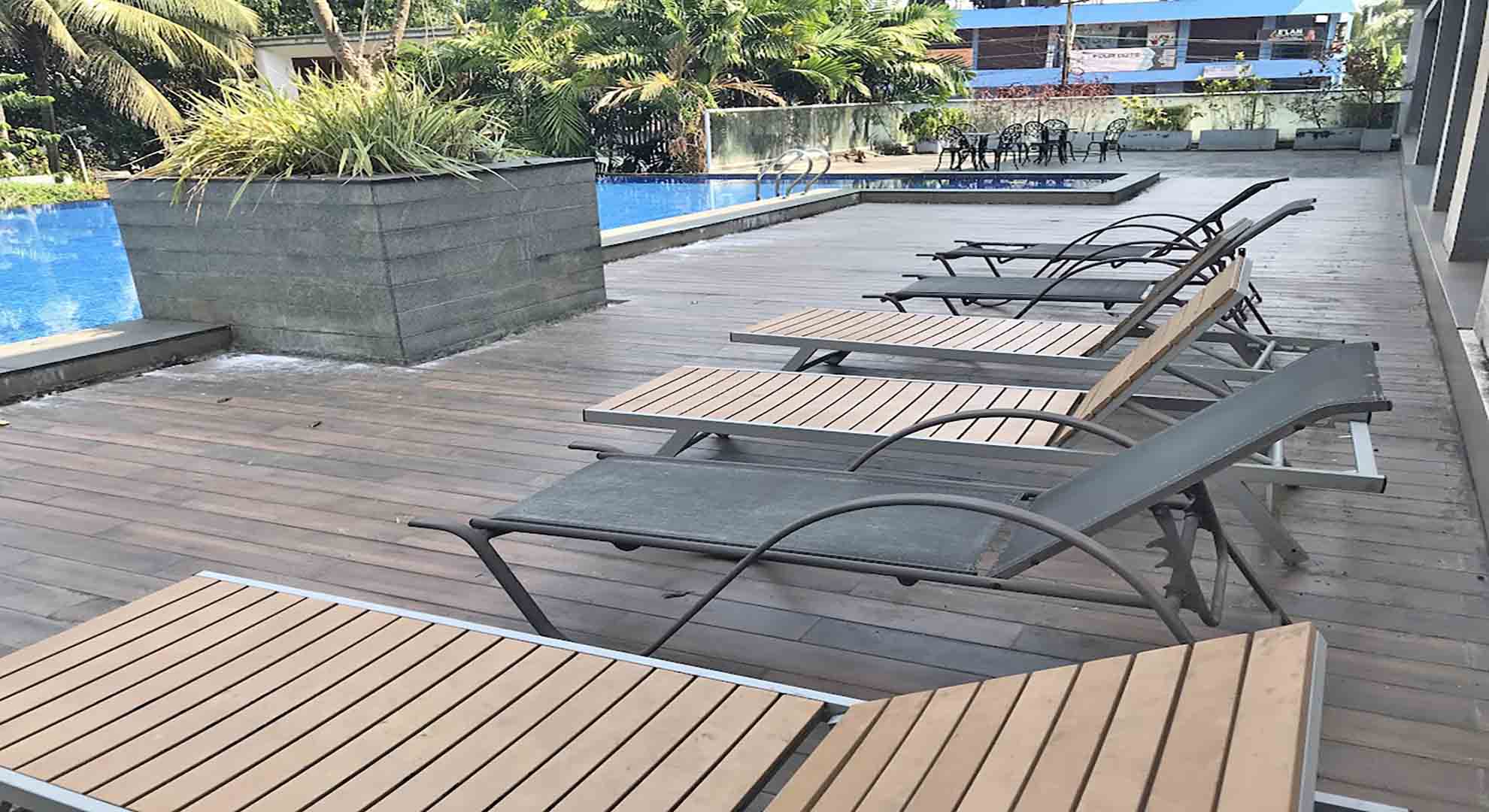 Infinity-edge swimming pool at Skyline The Edge luxury apartments in Thirumoola, Thiruvalla.