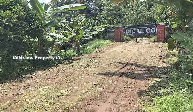 Gated entrance of 27 cents commercial land for sale in Thiruvalla Manjadi.
