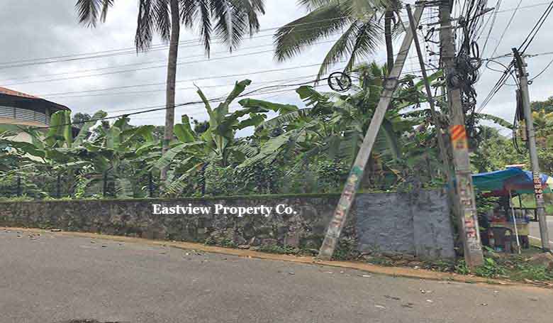 Commercial land for sale in Thiruvalla Manjadi with TK Road highway frontage.