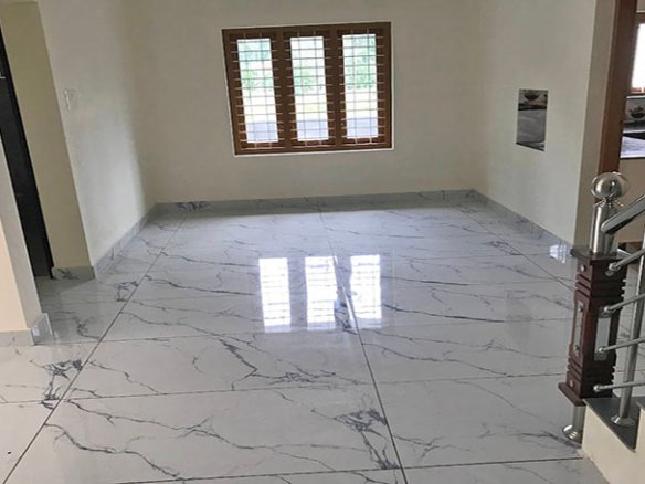 Large dining area in a 2-bedroom house for sale in Chengannur, Kerala, India.