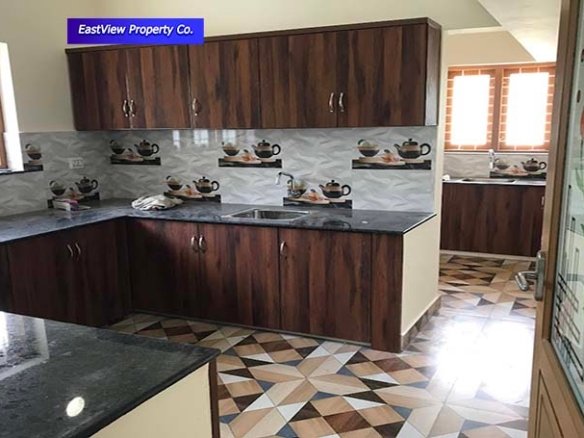 Modern kitchen design in new house for sale Chengannur