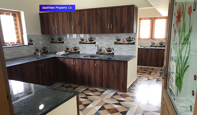 Modern kitchen design in new house for sale Chengannur