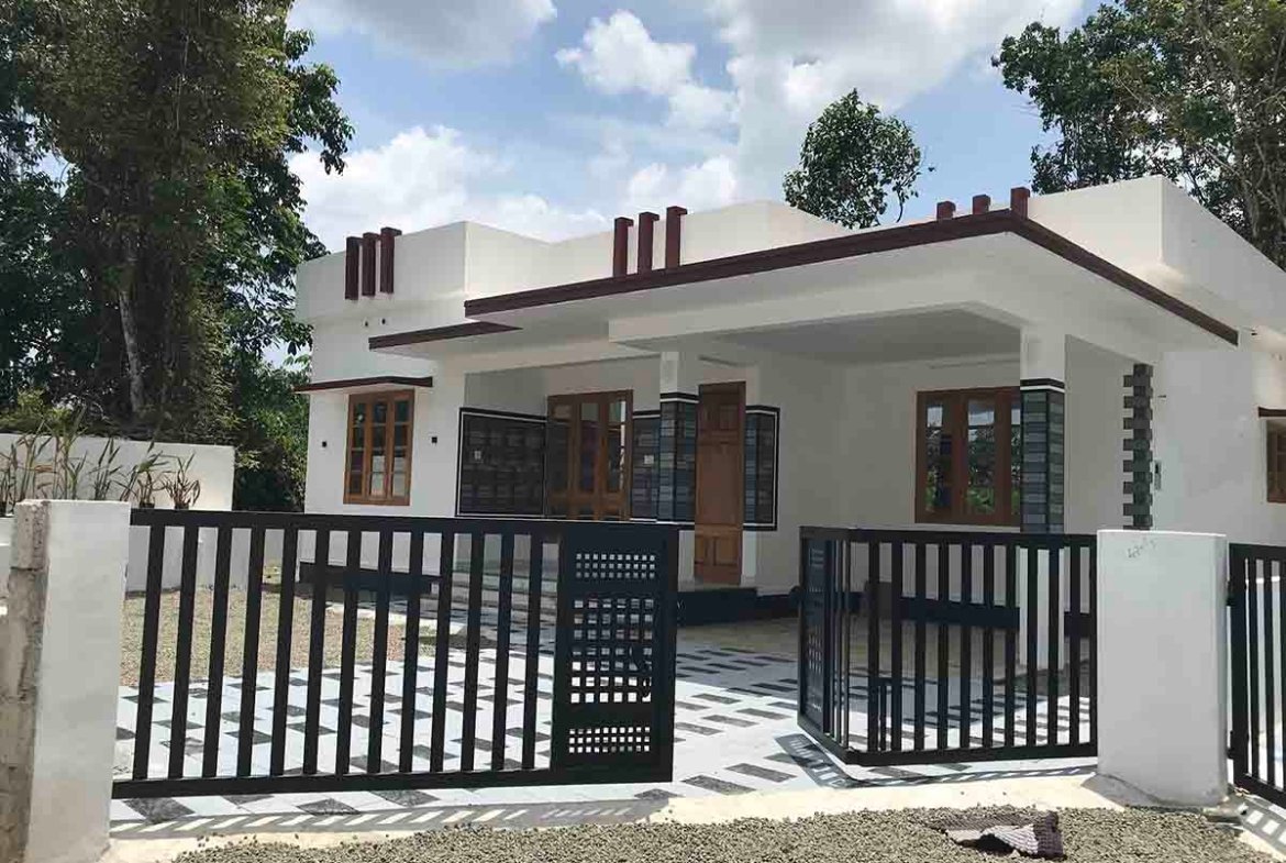 Modern single-story 3 BHK luxury gated villa exterior with private entrance gate and car porch.