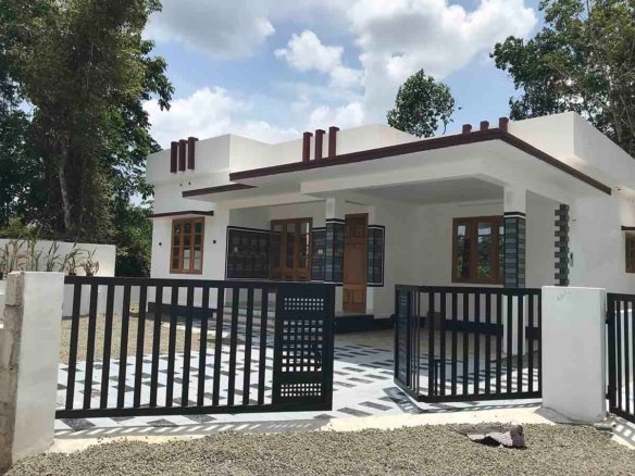 Modern single-story 3 BHK luxury gated villa exterior with private entrance gate and car porch.