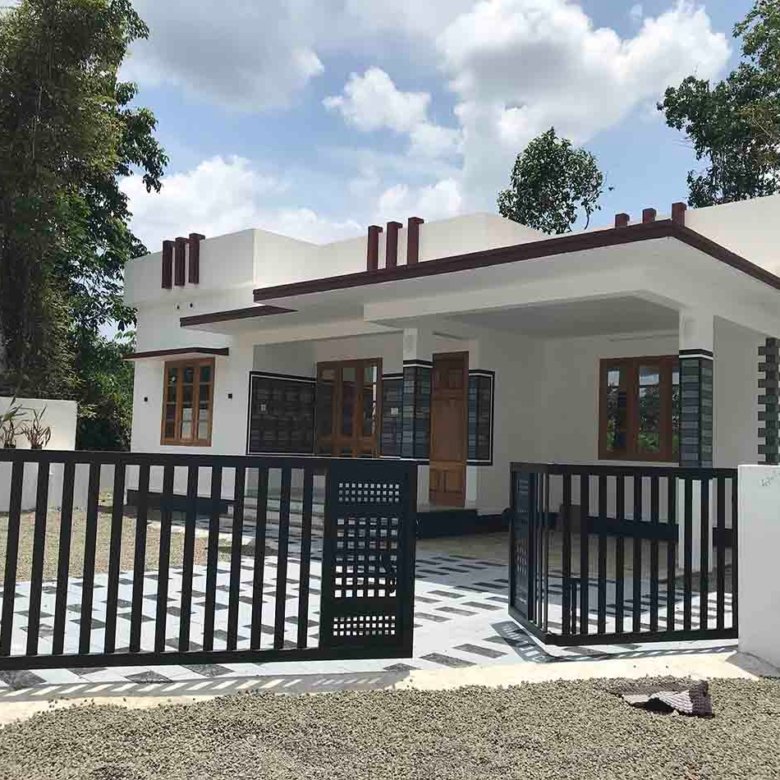 Modern single-story 3 BHK luxury gated villa exterior with private entrance gate and car porch.